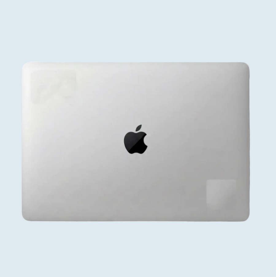 Stickered Good — Sticker ghosting plus light marks on the casing.