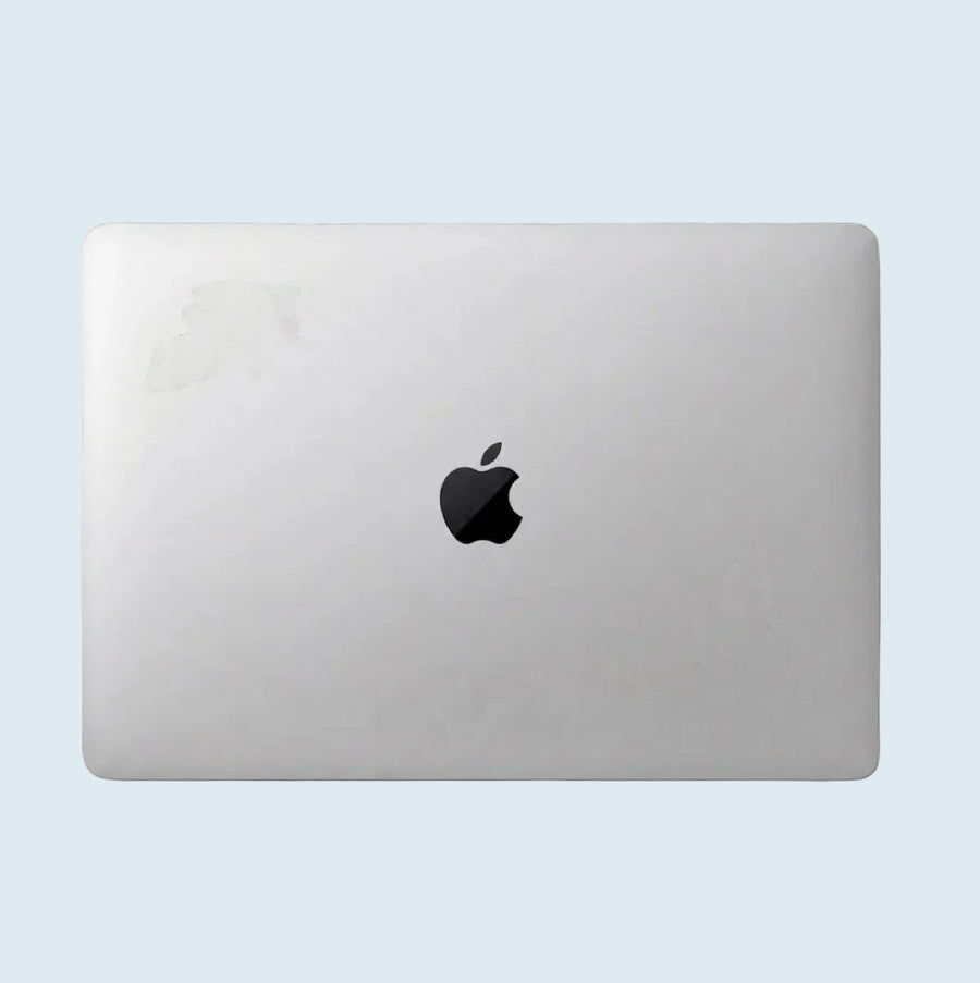 Stickered Excellent — Sticker ghosting on an otherwise clean, unmarked body.