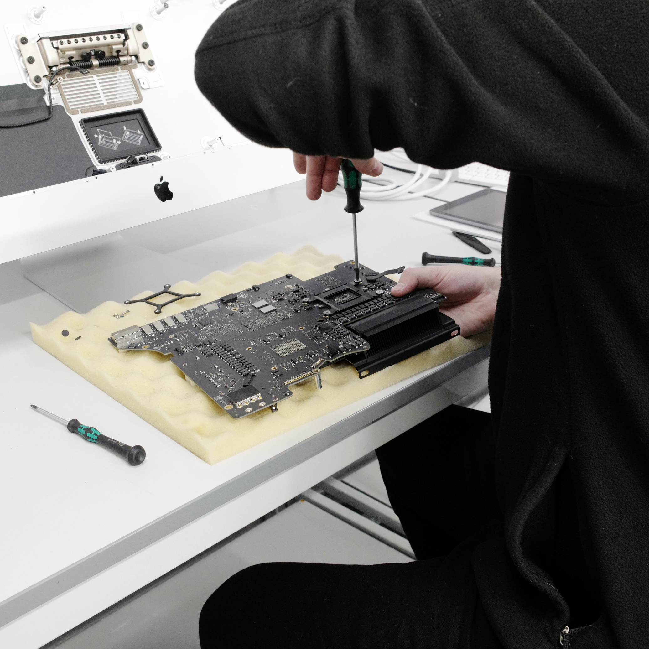 Mac technician at work